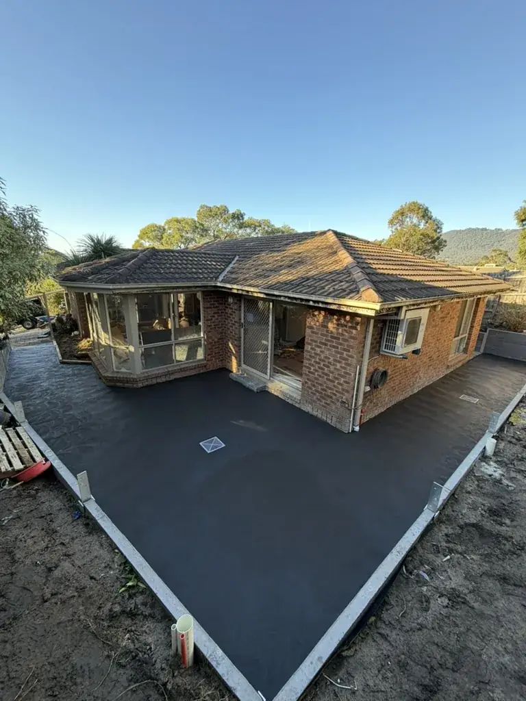Driveway excavated and base prepared for concrete